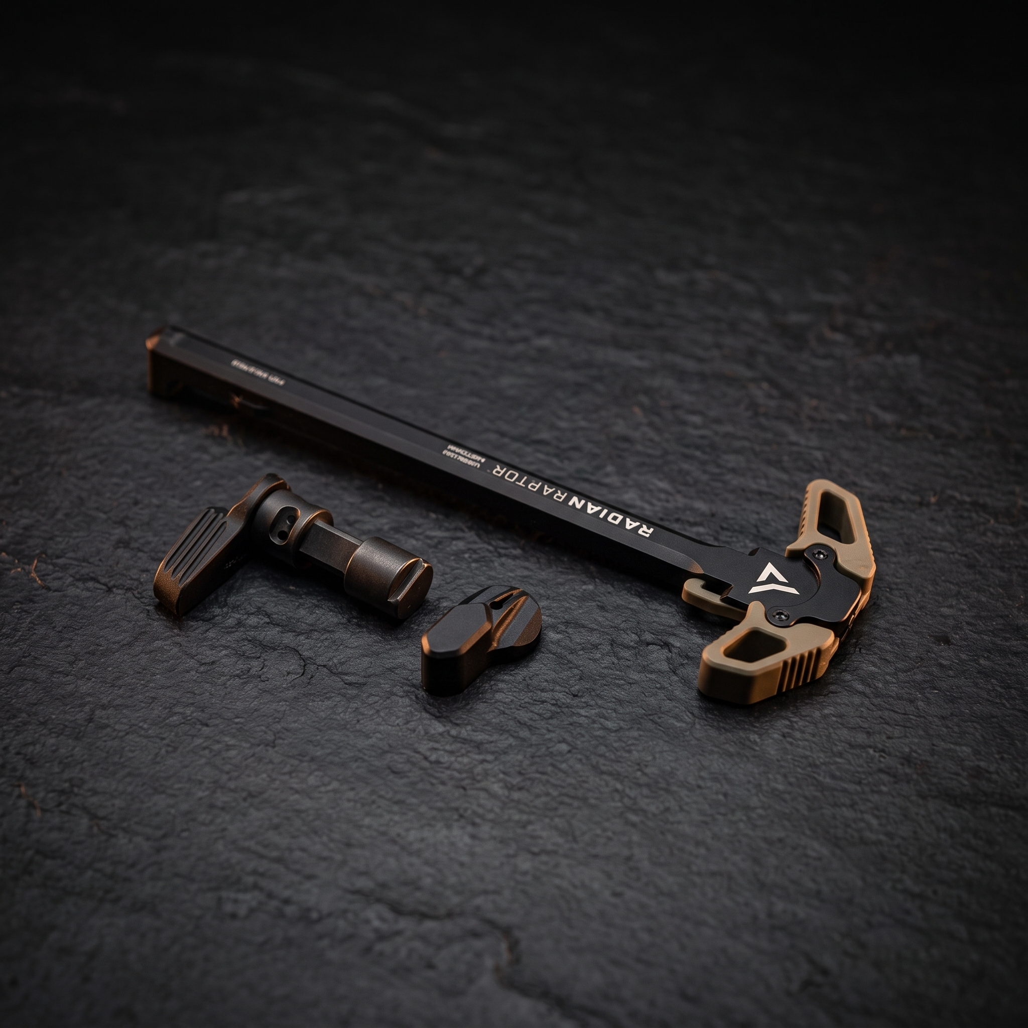 Radian Raptor charging handle beside a Radian Talon ambidextrous safety selector, accompanying our guide to ambidextrous AR-15 controls
