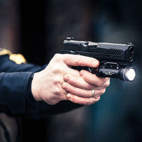 Streamlight TLR-1 HL 1000 lumen weapon light in black in a duty use setting