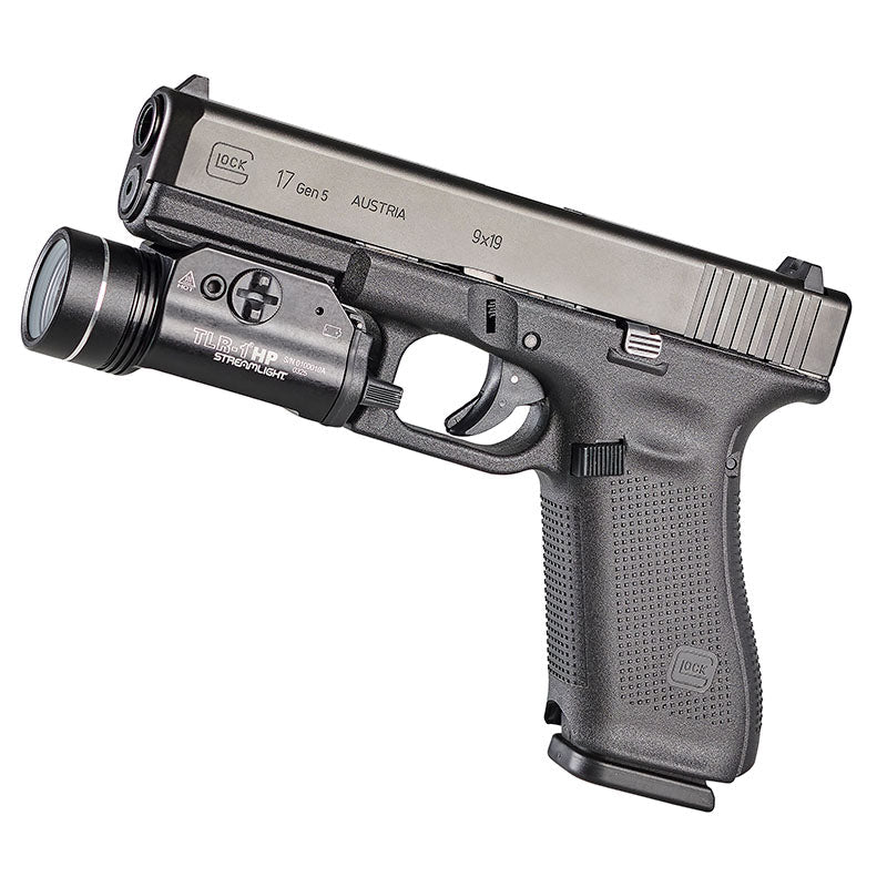 Streamlight TLR-1 HP weapon light with the two CR123A lithium cells that power it