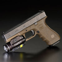 Streamlight TLR-2 G light and green laser in black, mounted on a Glock pistol rail