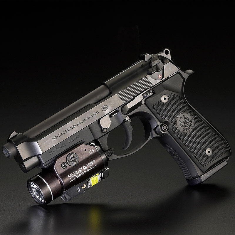 Streamlight TLR-2 G light and green laser in black, mounted on a Beretta handgun rail