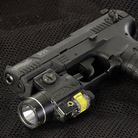 Streamlight TLR-4 G weapon light with green laser fitted beneath a handgun barrel