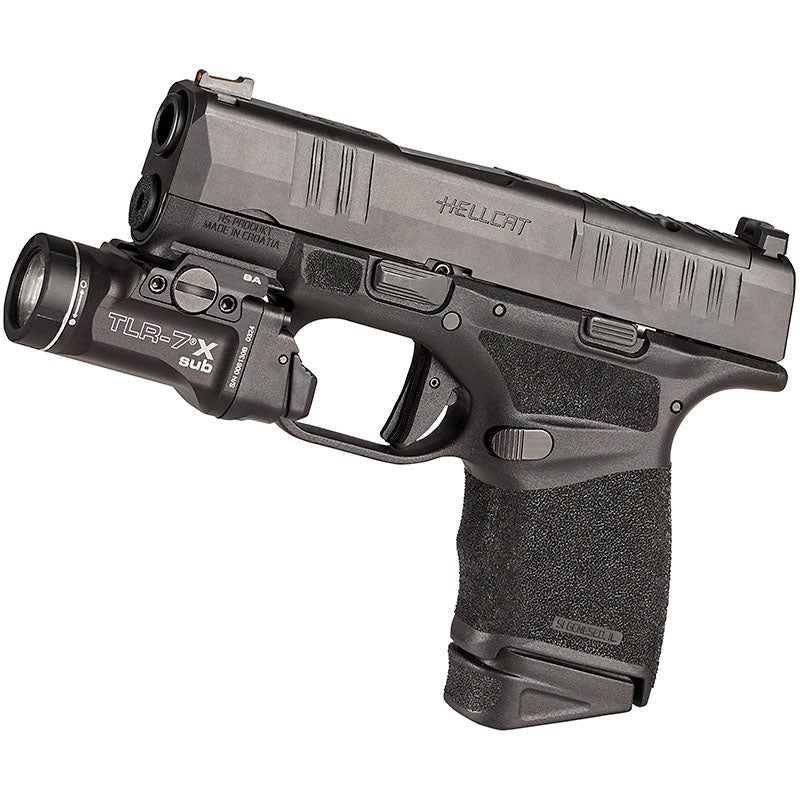 Streamlight TLR-7 X sub pistol light seen from above, showing the ambidextrous rear paddles