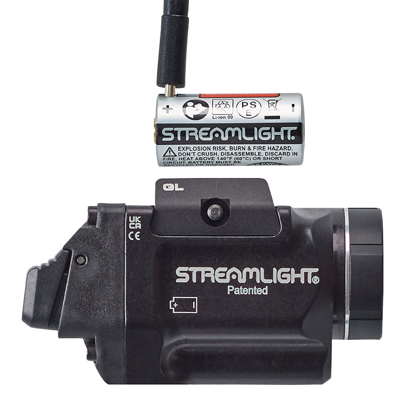 Streamlight TLR-8 X G sub weapon light showing the green aiming laser aperture