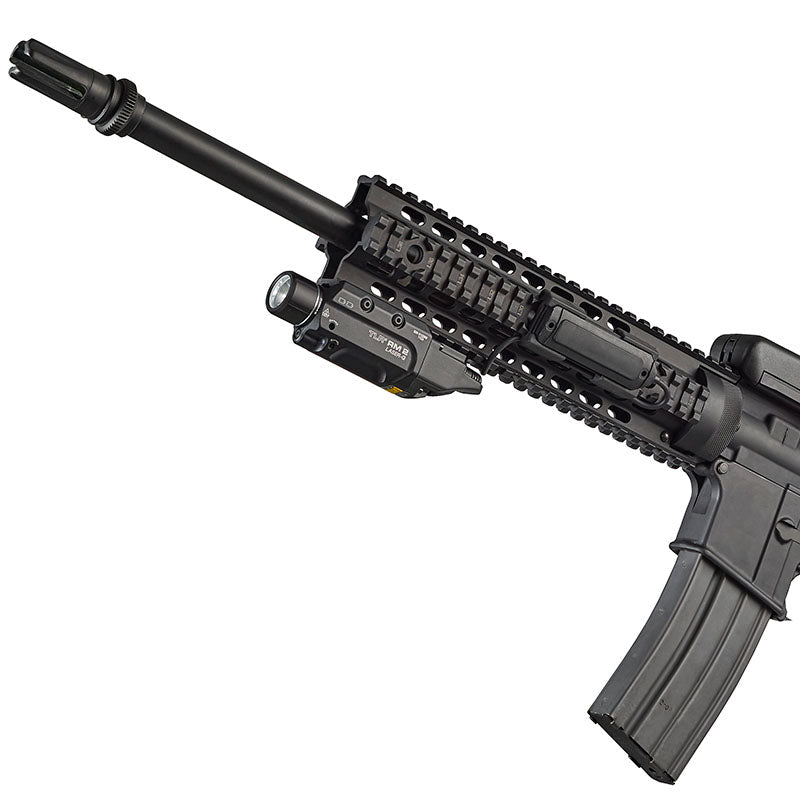 TLR RM 2 Laser-G weapon light with its Picatinny mounting interface and key kit